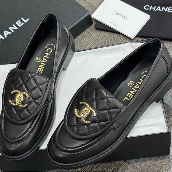 CHANEL Shoes - CHANEL Black Loafers with Gold Emblem